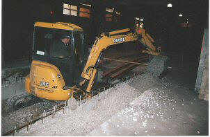 A Photo of us Working with a Backhoe